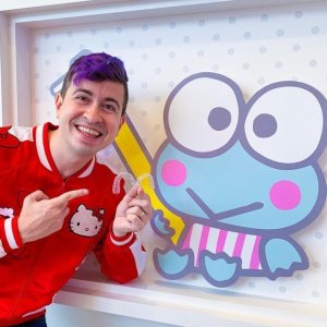 Adult Male dental patient with Take-Home Teeth Whitening Kit for Cosmetic Dentistry with Keroppi themed dental room