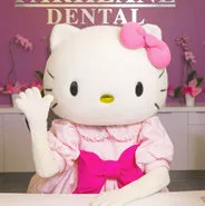 Hello Kitty waving to dental patients at Parklane Dental