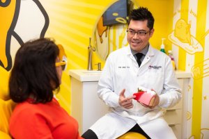 Doctor Showing Signs of Gum Disease