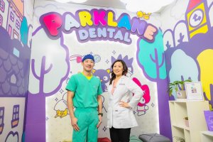 Cosmetic dentist and pediatric dentist at patient lobby of Hello Kitty dental office