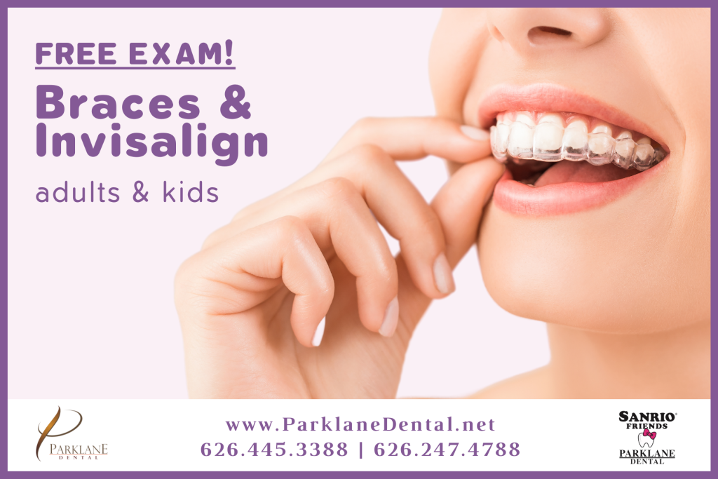 Patient holding Invisalign clear aligner trays for orthodontic dentistry for free Invisalign and braces exam