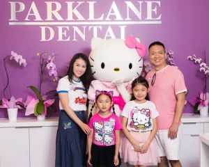 Hello Kitty with pediatric and adult patients for general and cosmetic dentistry for adults and kids