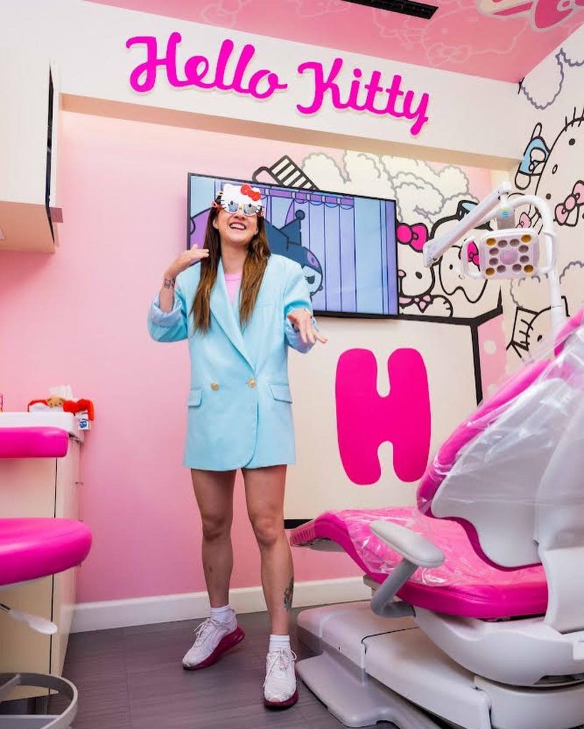 Adult Dental Patient happy with cosmetic dentistry treatments after a Smile Makeover in Hello Kitty dental room