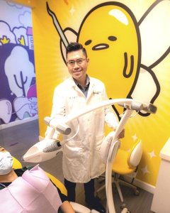 Laser teeth whitening for cosmetic dentistry with cosmetic dentist in Gudetama themed dental room